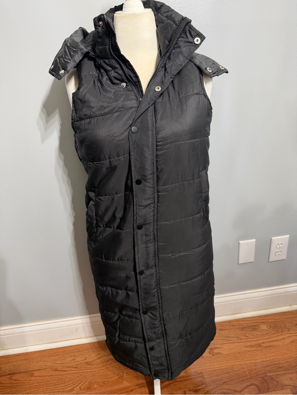 Long Sleeveless Puffer Vest in Black with Hood